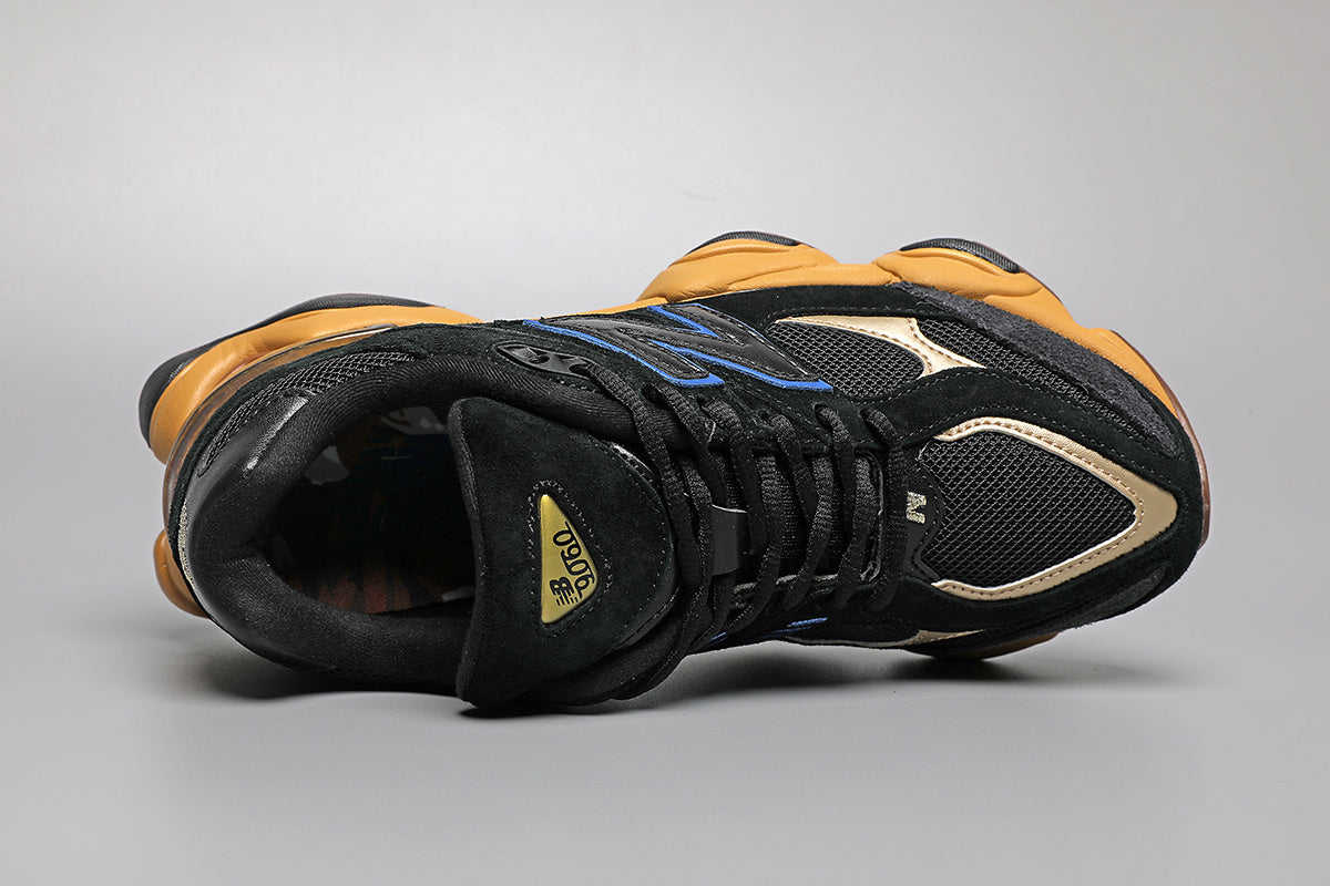 New Balance 9060 Unisex-Sneaker Schwarz-Gelb